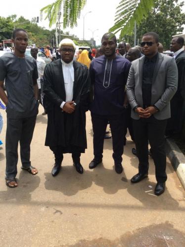 Barrister E.C Iphie with his older brother and friends